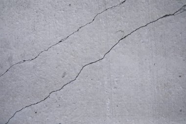 Gri kaldırım taşı, yaya geçidi, kaldırıma yakın kaldırım, dokusu, üst görünümü. Çimento tuğla kare taş zemin. Beton döşeme levhaları. Paving levhaları