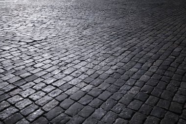 Gri kaldırım taşı, yaya geçidi, kaldırıma yakın kaldırım, dokusu, üst görünümü. Çimento tuğla kare taş zemin. Beton döşeme levhaları. Paving levhaları