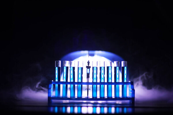 Test tube of glass overflows new liquid solution potassium blue conducts an analysis reaction takes various versions reagents using chemical pharmaceutics cancer manufacturing 