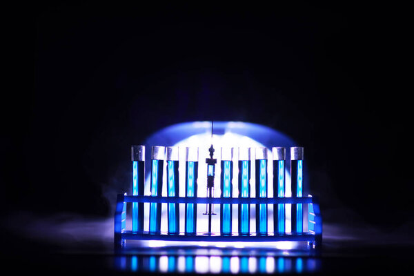 Test tube of glass overflows new liquid solution potassium blue conducts an analysis reaction takes various versions reagents using chemical pharmaceutics cancer manufacturing 