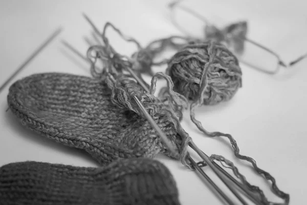 Skein of yarn to knit socks spokes monochrome