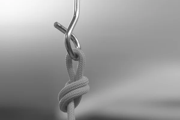 Climbing hook with rope knot insurance — Stock Photo, Image