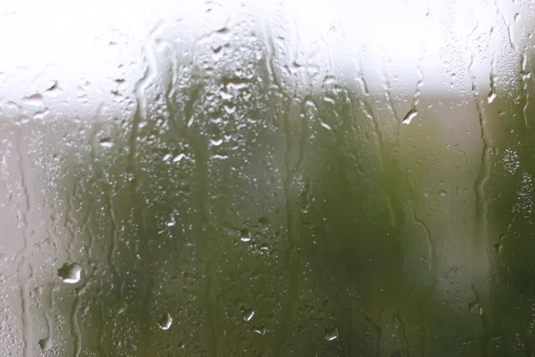 Gotas de chuva no vidro — Fotografia de Stock