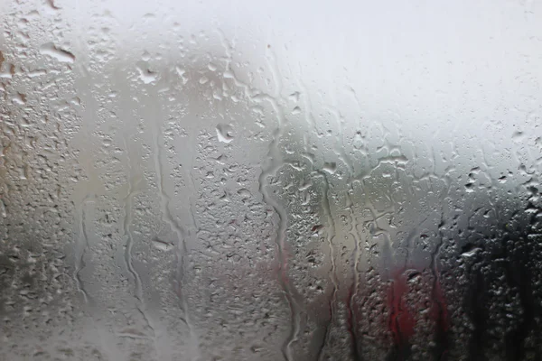 Gotas de chuva no vidro — Fotografia de Stock