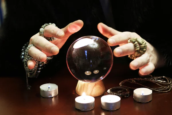 Hands above magic ball — Stock Photo, Image