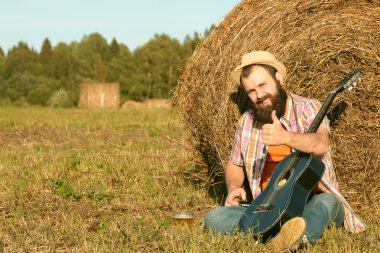 adam gitar ve bira niteliğine