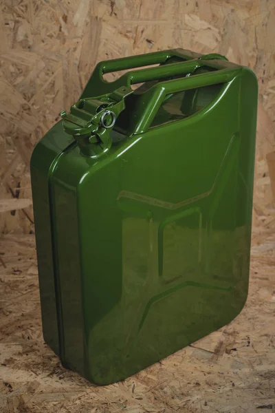 Brand New Green Metal Jerry Can Gas Container Standing Wooden — Stock Photo, Image