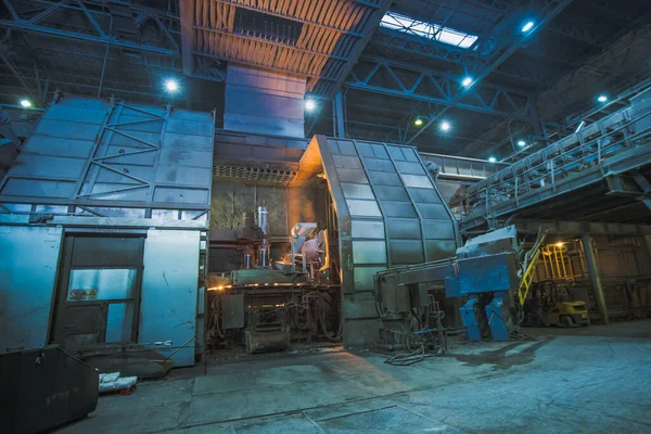 Furnace or steel mill ready to heat up or inject oxygen to provide extreme heat. Industrial manufacturing of steel.