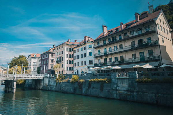 Beautiful river banks of Ljubljana, capital of Slovenia on a warm sunny august day.