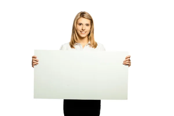 Portrait of a beautiful woman holding a blank billboard — Stock Photo, Image