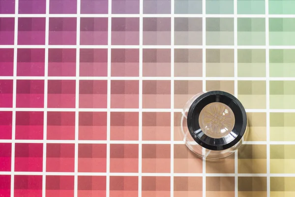 Magnifier on a color chart — Stock Photo, Image
