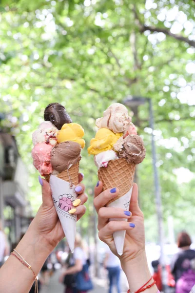 Female Hand Holding Colorful Ice Cream Wafer Empty Copy Space — Stock fotografie