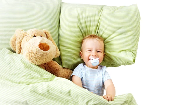 Годовалый ребенок в кровати — стоковое фото