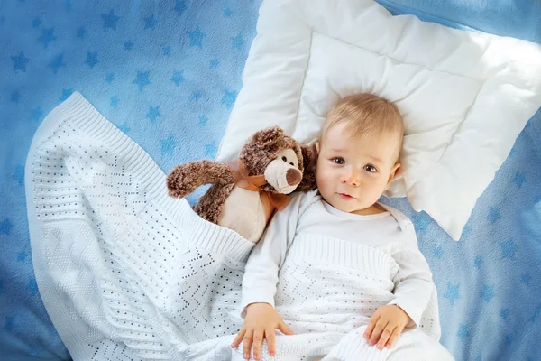 One year old baby with a teddy bear — Stock Photo, Image