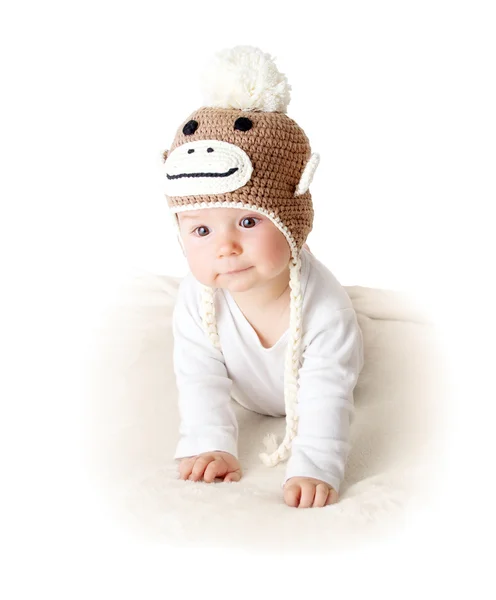 Baby in monkey hat — Stock Photo, Image