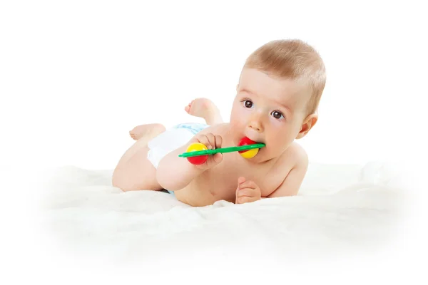 Baby hålla en leksak — Stockfoto