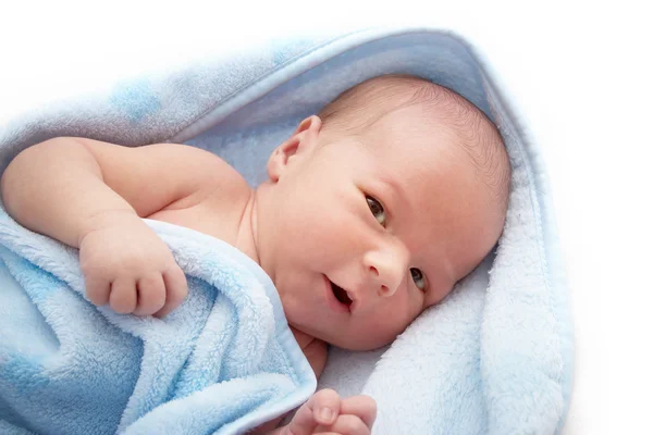 One week old baby in blanket on white background — 스톡 사진