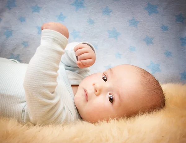 Baby on lamb wool — Stock Photo, Image