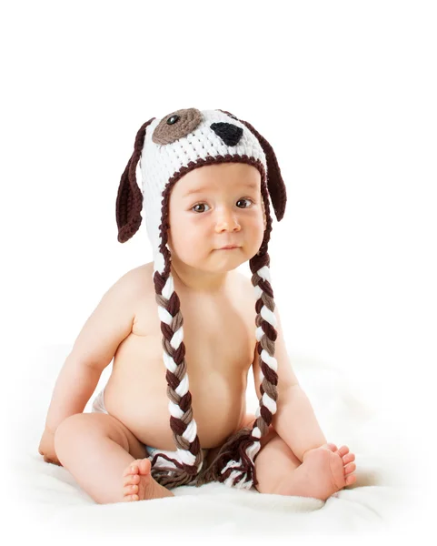 흰색 배경에 고립 된 개 모자에 아기 — 스톡 사진