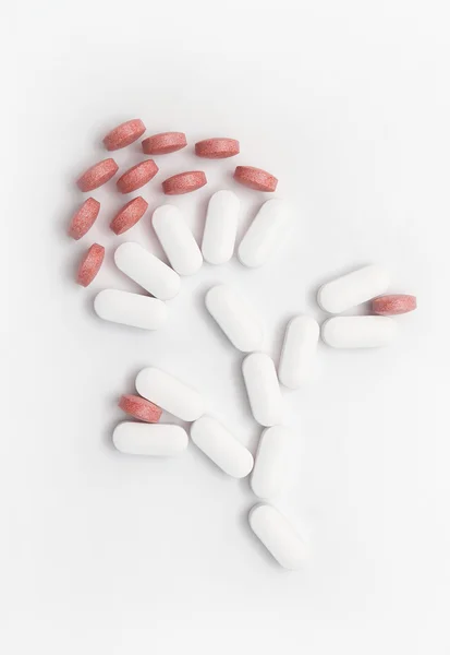 Flower shaped pills — Stock Photo, Image