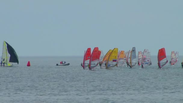 Yacht racing is a competition of athletes in sailing sports in may 2015 in the Black sea near the city of Sochi — Stock Video