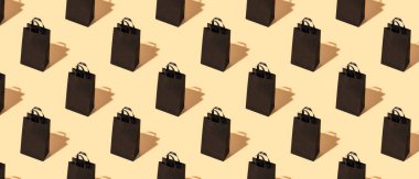 Bej bir arka plan kara büyü paketindeki desen. Kara Cuma konsepti. Büyük indirim.