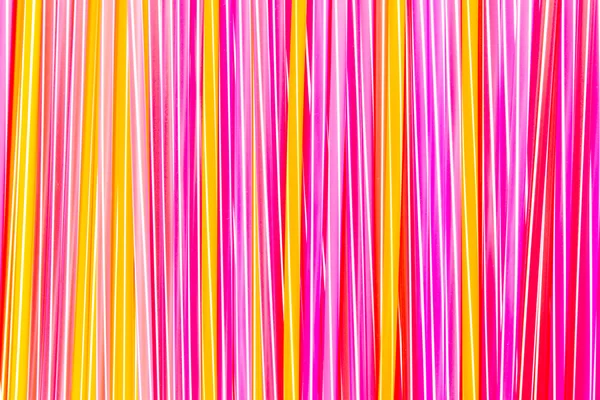 Background of Striped drink straws in different colors