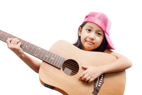 Little girl red dress standing with guitar. Stock Image