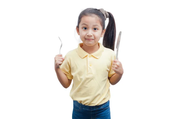 Çatal ve bıçak tutan genç kız.