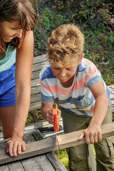 Mother teaching son — Stock Photo, Image