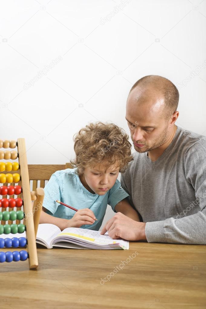 Dad teaching son