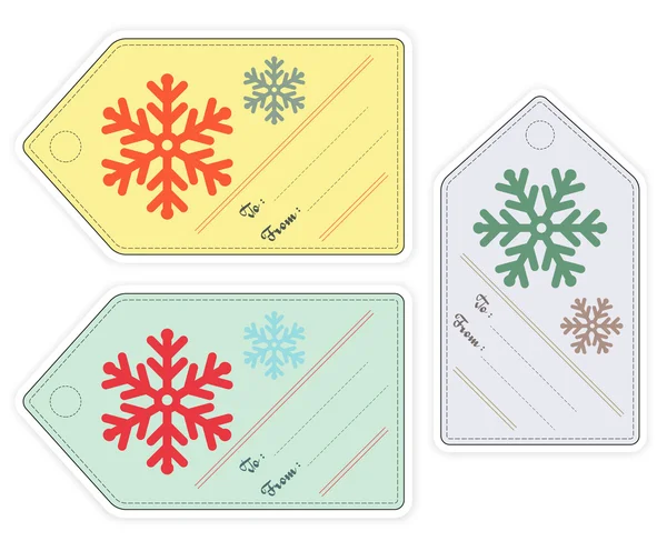 Ensemble d'étiquettes cadeaux de Noël en différentes couleurs avec des flocons de neige — Image vectorielle