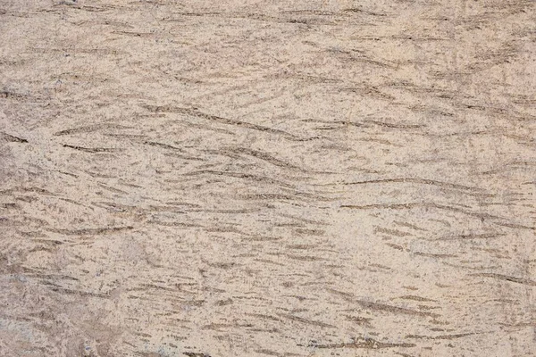 グレーの波線でベージュの壁 ざらざらとした表面 — ストック写真