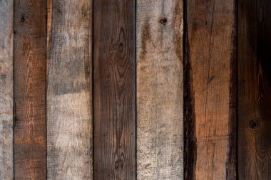 Eski çatlamış ahşap çitler. Dikey çizgiler. kabaca yüzey dokusu