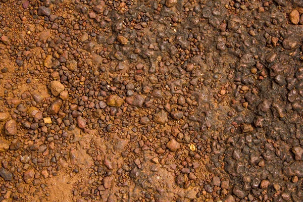 Rotgelber Felsen Mit Vielen Kleinen Steinen Unterschiedlicher Größe Natürliche Raue — Stockfoto