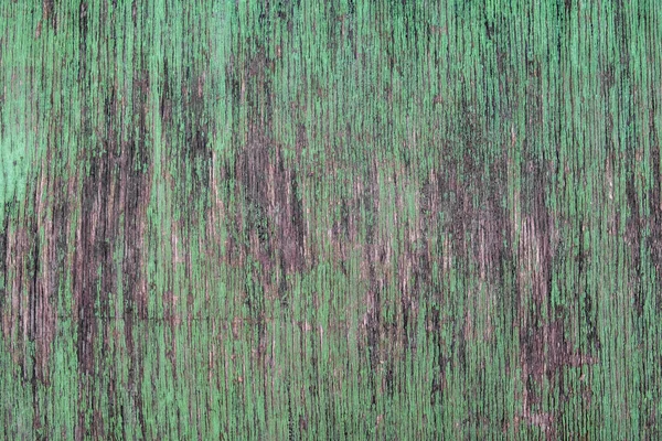緑の塗料や亀裂を剥離古いグレーの木製のボード ざらざらした質感 — ストック写真
