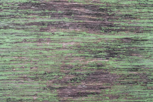 緑の塗料や亀裂を剥離古いグレーの木製のボード ざらざらした質感 — ストック写真