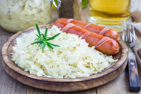 Homemade sauerkraut with sausages — Stock Photo, Image