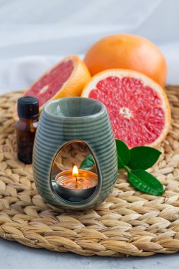 Aroma lamba greyfurt esans, spa arka plan, dikey