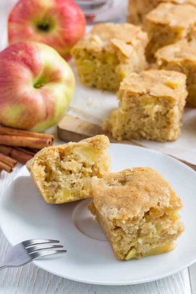 Homemade blondie (blonde) brownies apple cake, square slices on plate — Stock Photo, Image