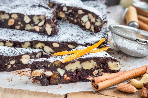 Panforte italian christmas dessert with nuts and candied fruits, horizontal