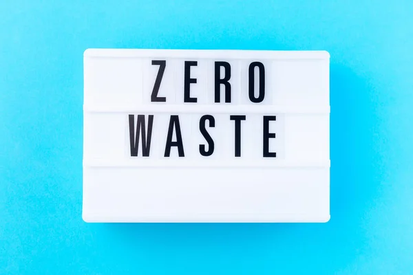 Lightbox with words Zero waste on a blue background, zero waste or plastic free concept, horizontal, top view
