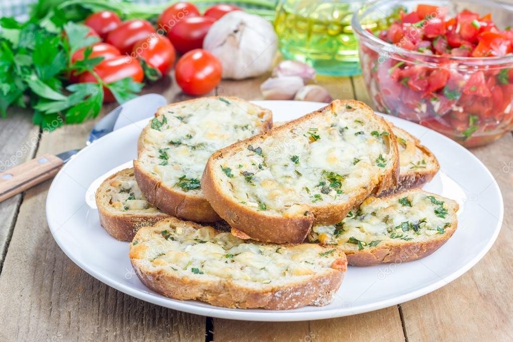 Crostini with basil, parsley, garlic and cheese 