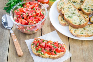 Bruschetta domates, otlar ve kızarmış sarımsak peynir ekmek üzeri yağlıboya