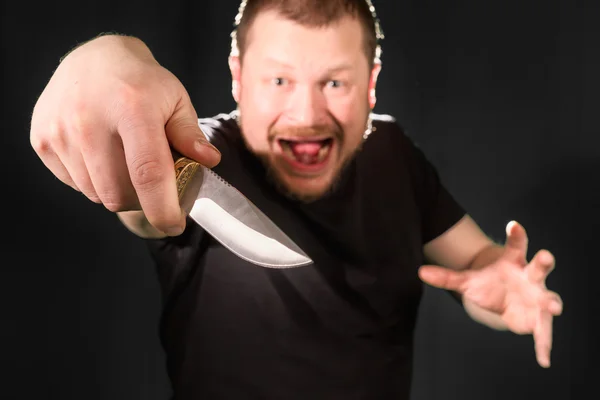 Portrait of a gangster with a knife — Stock Photo, Image