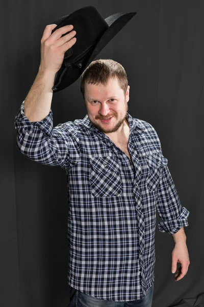 Vaqueiro homem na camisa xadrez — Fotografia de Stock