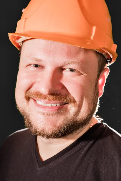 Werknemer in veiligheid helm emotionele portret — Stockfoto