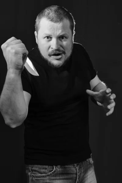 Portrait of a gangster with a knife — Stock Photo, Image