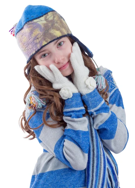 Pretty teen girl in winter clothes getting warm — Stock Photo, Image