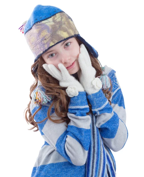 Pretty teen girl in winter clothes getting warm — Stock Photo, Image